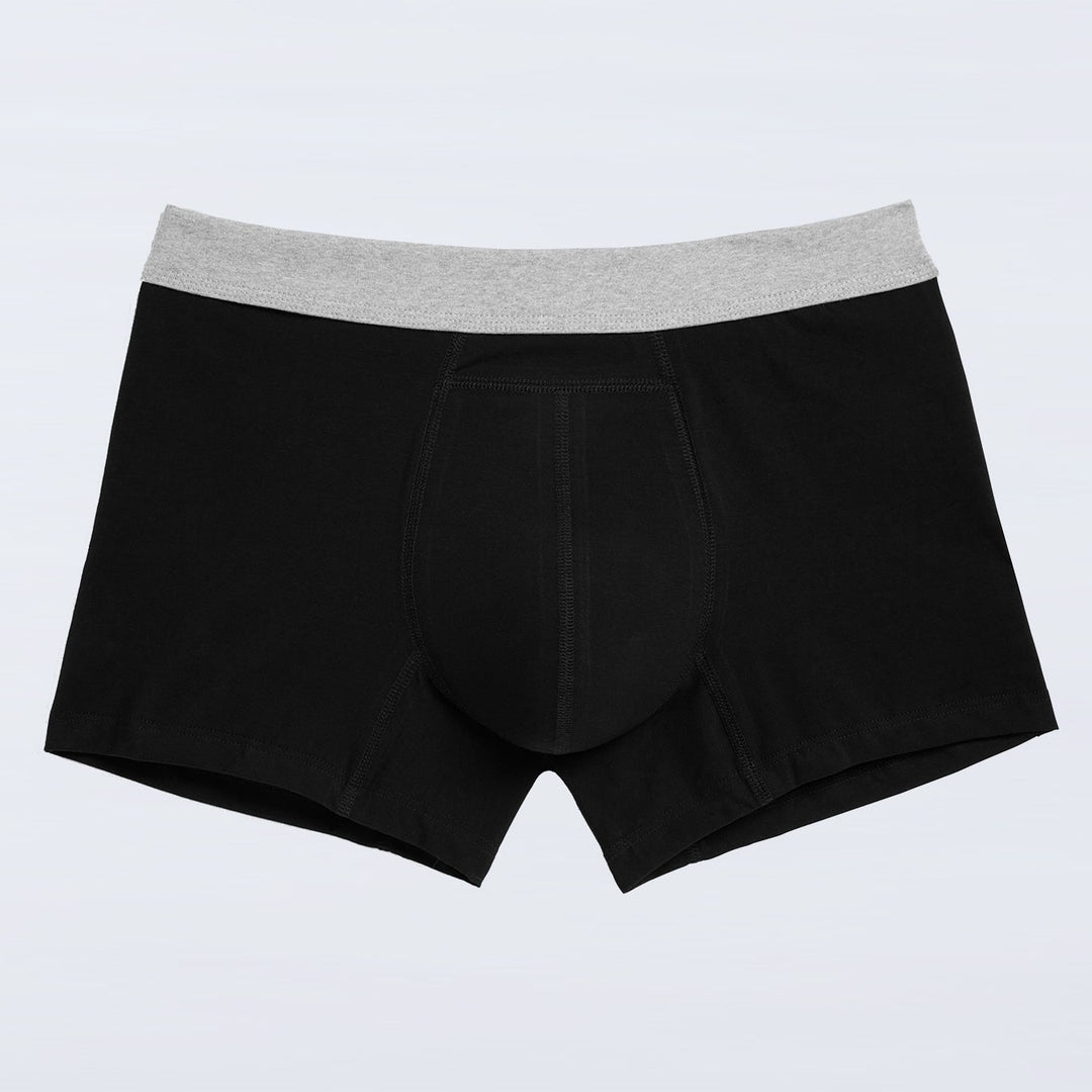 Boxer absorbant lavable homme avec protection intégrée, conçu pour l'incontinence légère, en tissu confortable et extensible, semblable à un boxer classique.