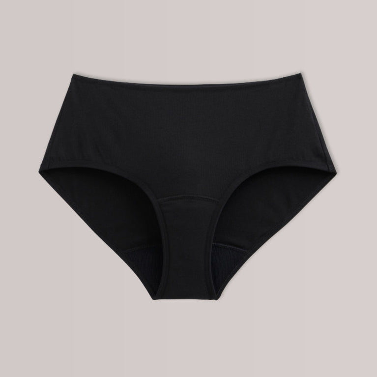 Lot de 3 sous-vêtements en coton biologique TENA pour femmes, offrant confort et protection, conçus pour l'incontinence légère, avec coupe classique haute et technologie évacuant l'humidité.