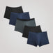 Lot de 5 Boxers Absorbants TENA Men, disposés en éventail, offrant confort et protection discrète contre l&